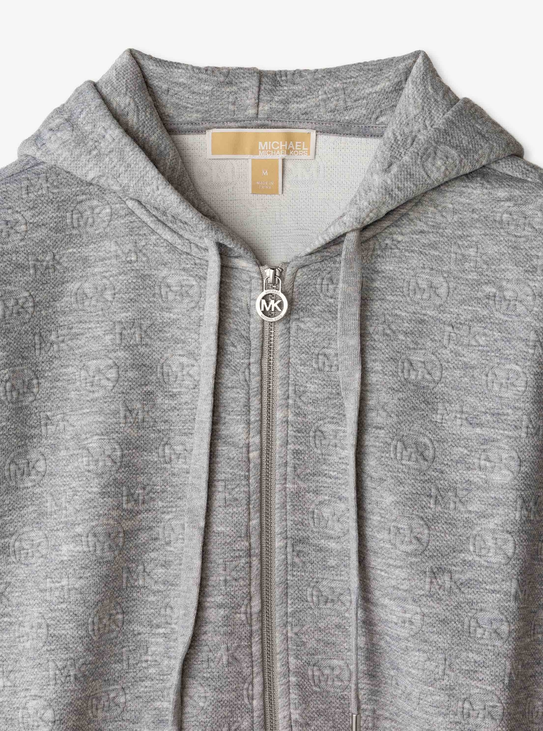MICHAEL KORS マイケルコース ロングスリーブ ジップアップ フーディ MICHAEL KORS（マイケルコース）の「ロゴテープ ジップ