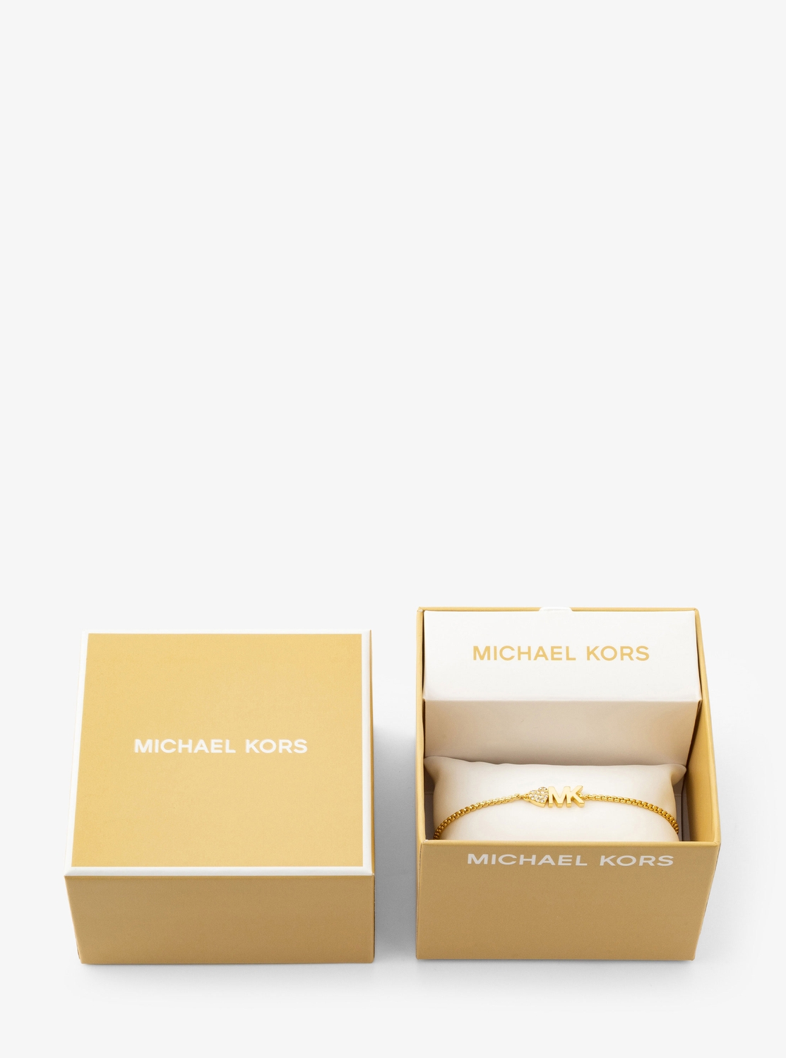 MICHAEL KORS ロゴ入りハードケース 公式アウトレット】ロゴ ハート スライダー ブレスレット